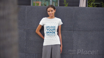 T-Shirt Video Featuring a Young Woman Posing in an Urban Scenario 3380v