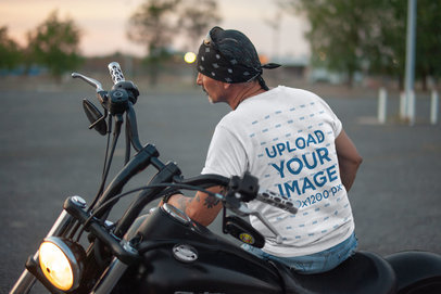 Back-View Tee Mockup of a Middle-Aged Biker Watching the Sunset 20218a
