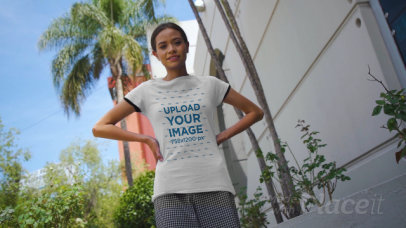 Video of a Woman Pointing at Her T-Shirt in an Urban Scenario