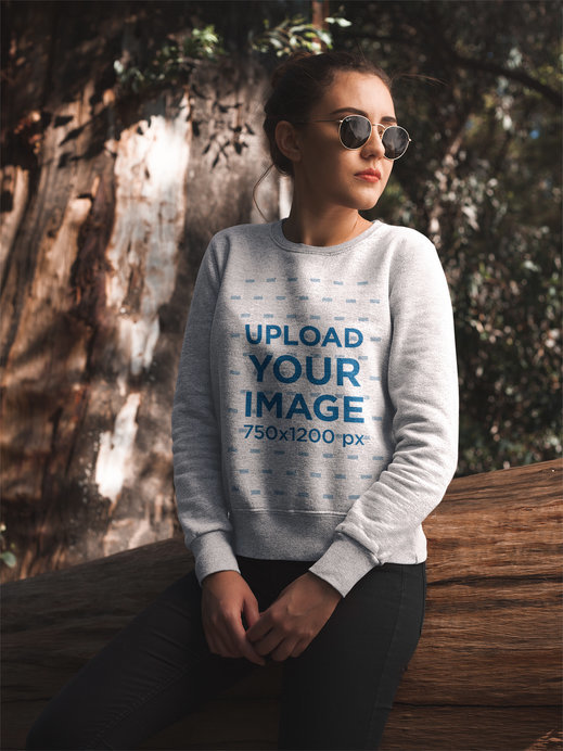 Placeit Pretty Woman in the Forest Wearing a Crew Neck Sweatshirt