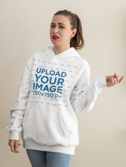 Pullover Hoodie Mockup of a Woman Doing a Disgusted Face M20943