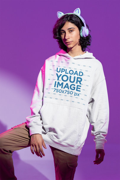 Mockup of a Young Man Wearing an Oversized Heather Hoodie  m28514