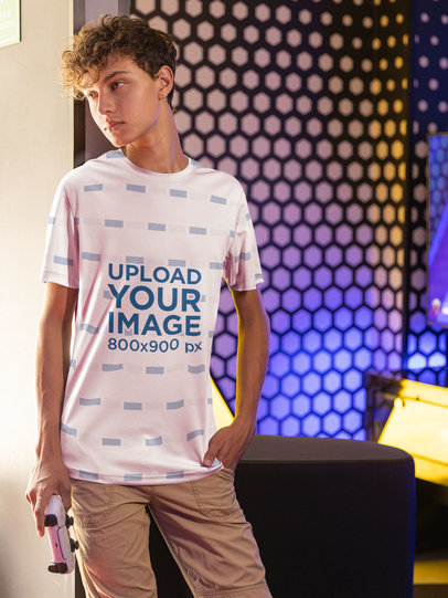 Sublimated Jersey Mockup of a Young Gamer Leaning on a Wall  m28537