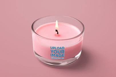 Mockup of a Pink Candle Placed on a Colorful Background m30361 r-el2