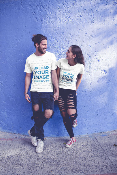 T-Shirt Mockup Featuring a Young Couple in Love Walking Around