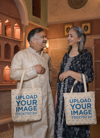 Mockup of a Happy Senior Couple Carrying Tote Bags m32701