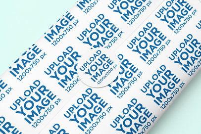 Placeit - Mockup of a Folded Wrapping Paper With a Sticker