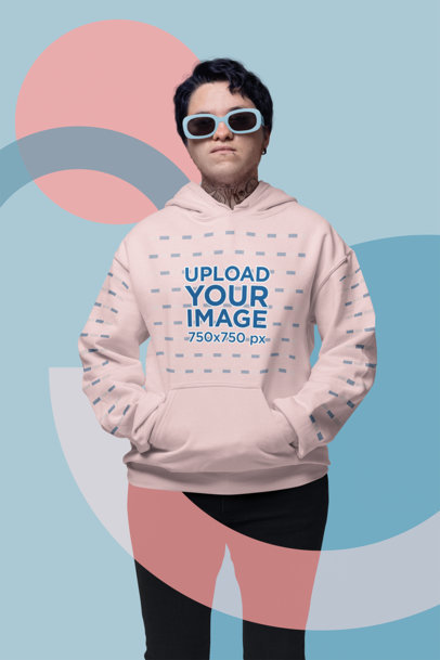 Gildan Pullover Hoodie Mockup of a Man with Sunglasses Posing for Trans Visibility Day m32897