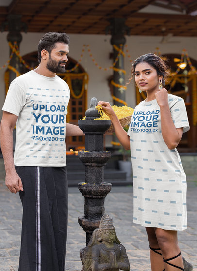 Crewneck Tee and T-Shirt Dress Mockup of a Couple Posing by a Decorated Indian Building m33154