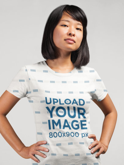 Sublimated Round Neck T-Shirt Mockup of a Woman in a Studio