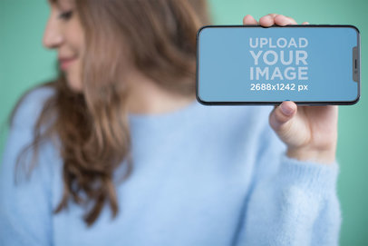 Mockup of an iPhone XS Max Being Hold by a Girly Girl 25369