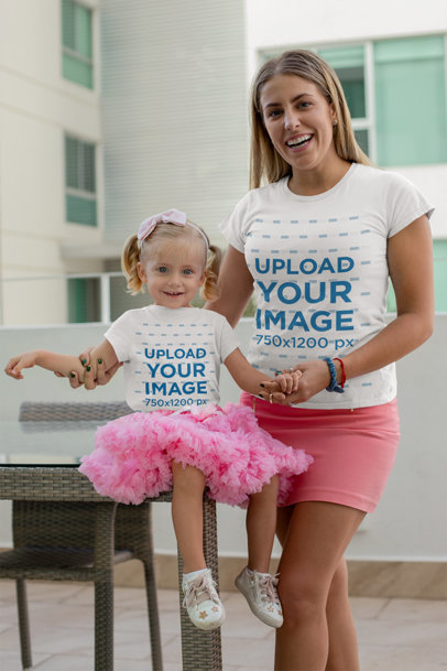 Mockup of a Mom and Her Baby Girl Wearing T-Shirts and Pink Skirts