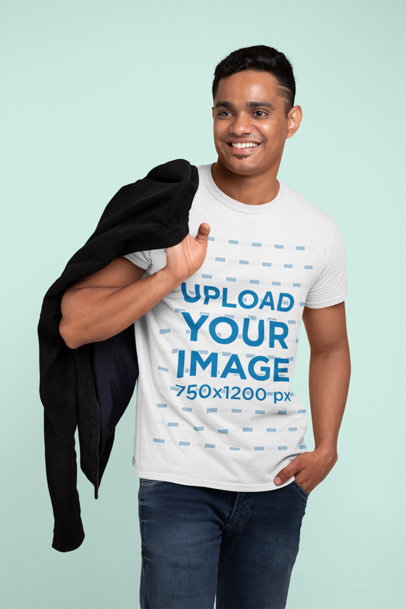 T-Shirt Mockup of a Man at a Studio Smiling