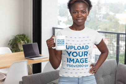 T-Shirt Mockup of a Woman Holding an 11 oz Mug in Her Living Room 30329