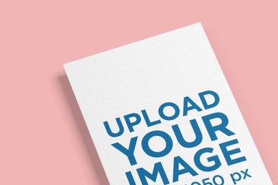 Close-up Mockup of a Vertical Business Card Against a Flat Surface 1681-el