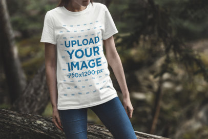 T-Shirt Mockup Featuring a Woman in the Woods