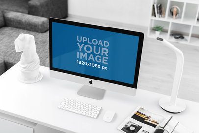 Mockup of an iMac at a Modern Office 