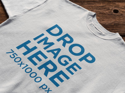 T-Shirt Mockup Over a Wooden Surface