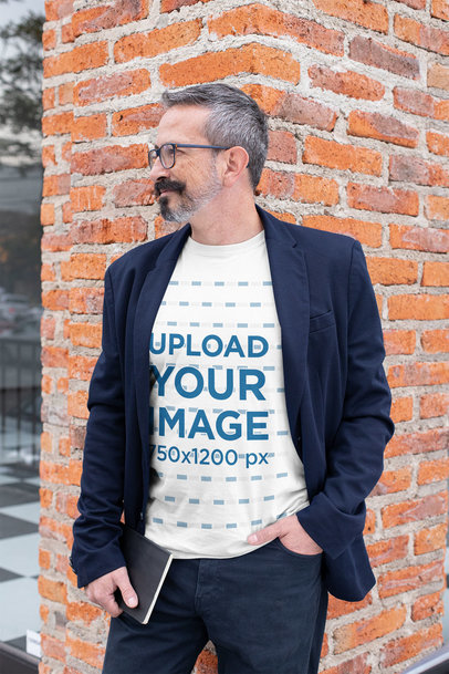 T-Shirt Mockup Featuring a Middle-Aged Man Wearing a Blazer 