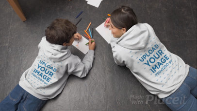 Hoodie Video Featuring a Woman and Her Son Drawing on the Floor 32339