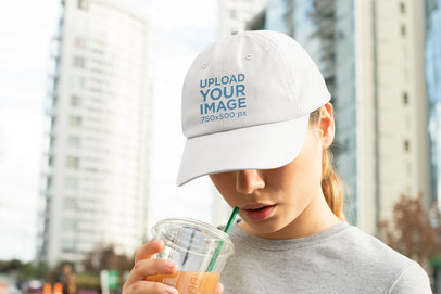Dad Hat Mockup of a Woman with a Beverage 32456