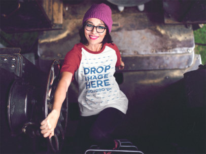 Raglan T-Shirt Mockup of a Girl Climbing Up a Train Ladder b12502