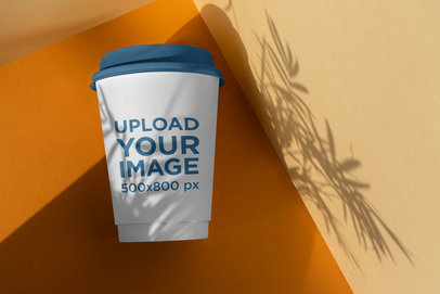 Elegant Mockup of a Coffee Cup Under a Shadow