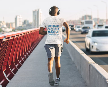 T-Shirt Mockup of an Athletic Man Running Away from the Camera 39362-r-el2