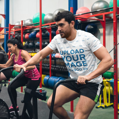 Sublimated T-Shirt Mockup of a Man Doing Cardio in an Elliptical Machine 46745-r-el2